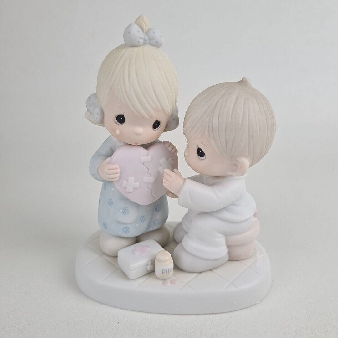 Precious Moments 100080 He's the Healer of Broken Hearts Porcelain Figurine