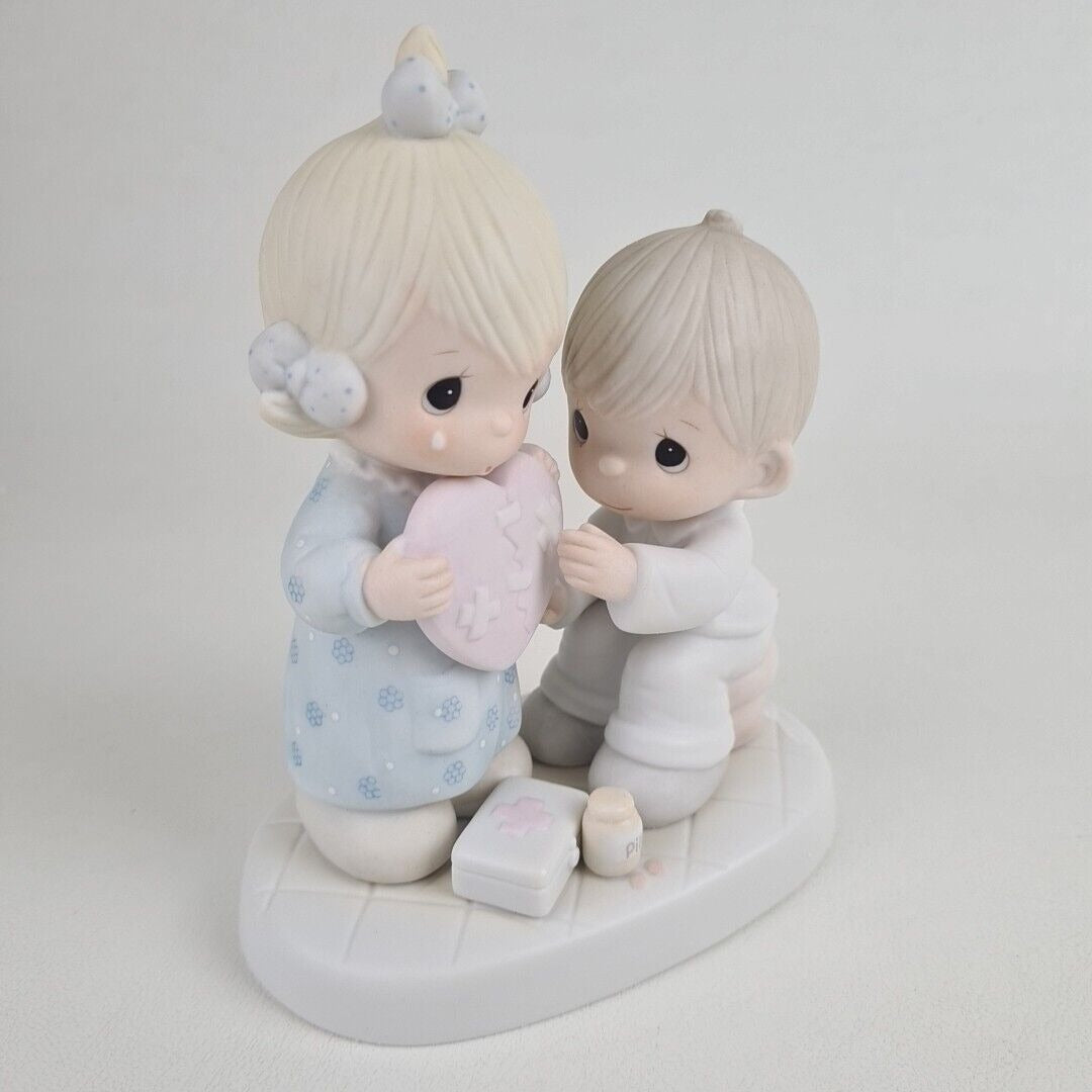 Precious Moments 100080 He's the Healer of Broken Hearts Porcelain Figurine