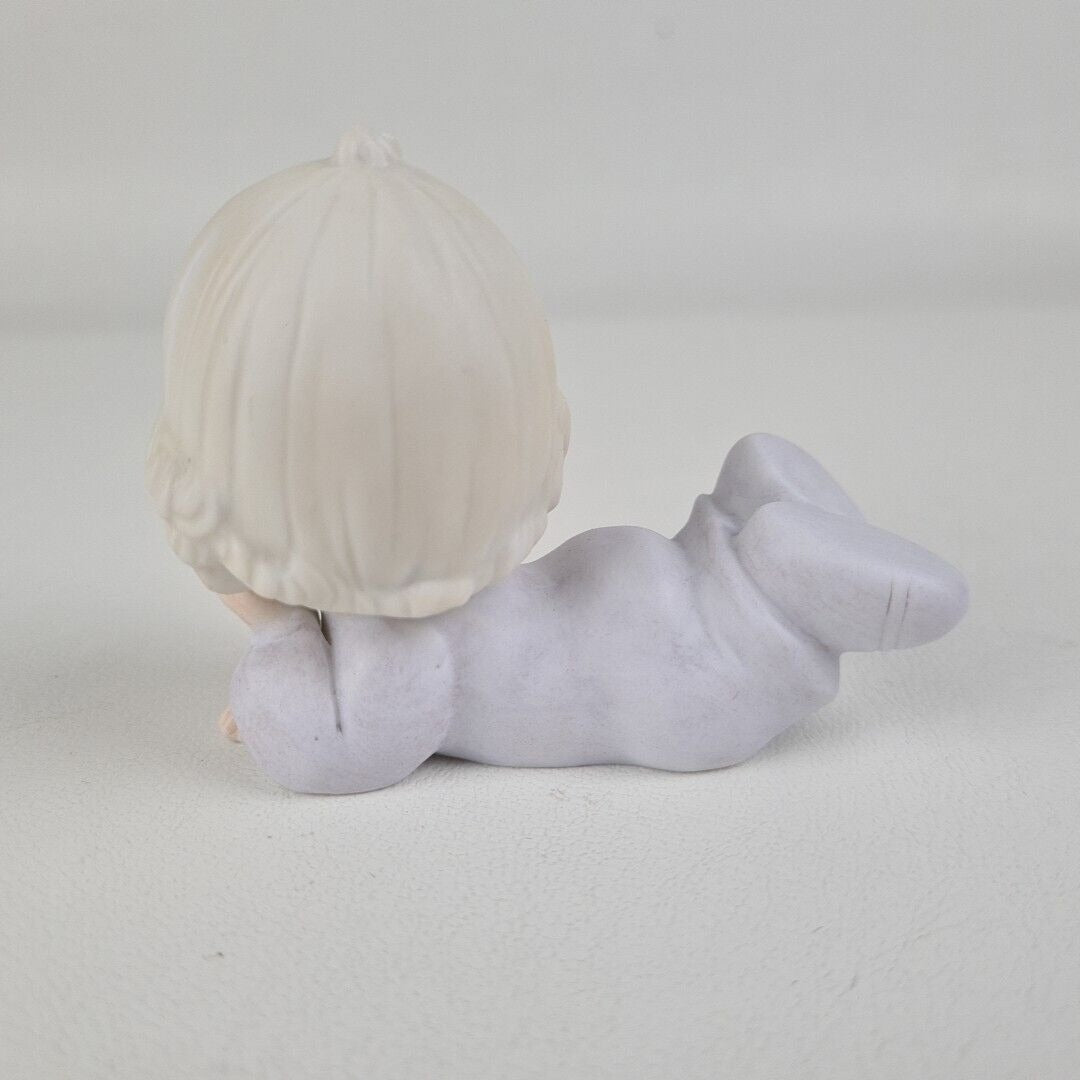 Precious Moments Baby Laying Down E-2852/F Collectible Porcelain Figurine